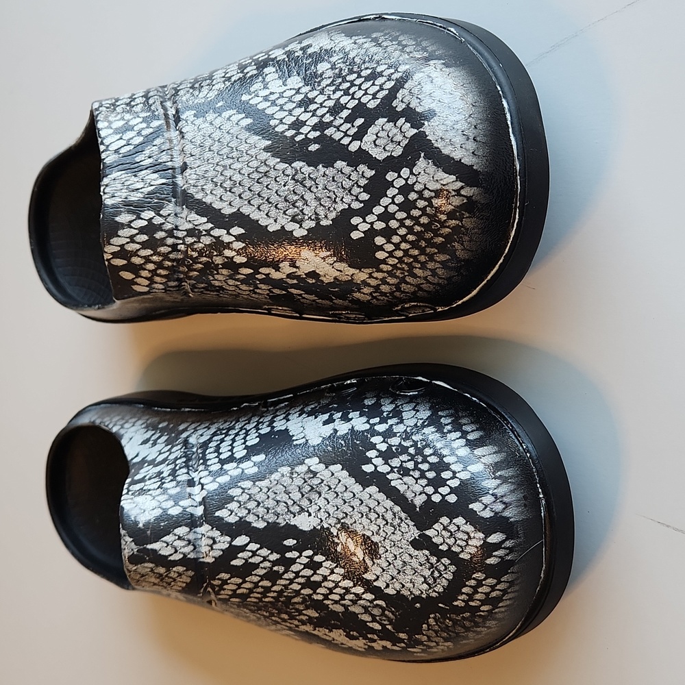 OOFOS clogs, recommended by my foot doctor for support.